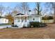 Charming bungalow-style home with a welcoming front porch and freshly landscaped yard at 1020 Pinedale Se Dr, Smyrna, GA 30080