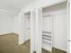 Spacious closet features open shelving and bi-fold doors for organized storage at 1126 Berkley Se Dr, Smyrna, GA 30082