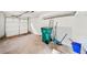 Single car garage with white walls and concrete floor at 1126 Berkley Se Dr, Smyrna, GA 30082