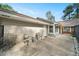 Cozy outdoor patio with two chairs and a small side table with access to the main house at 1126 Berkley Se Dr, Smyrna, GA 30082