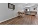 Open living space with hardwood floors, plenty of natural light, and neutral wall color at 121 Riverwatch Ct, Canton, GA 30114