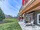 Charming patio with lounge seating, fan, and view of backyard, ideal for enjoying outdoor living at 121 Riverwatch Ct, Canton, GA 30114