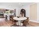 Dining room area features a round table with modern chairs adjacent to the gourmet kitchen at 2567 Astaire Ct, Atlanta, GA 30318