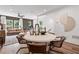 Dining room with hardwood floors, modern decor and large windows allowing for ample natural light at 2567 Astaire Ct, Atlanta, GA 30318