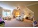 Charming bedroom boasts a ceiling fan, large window, and ample space for furniture at 3299 Carmichael Pl, Duluth, GA 30097