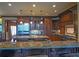 Spacious kitchen features a large island with seating, stainless steel appliances, and custom wood cabinets at 3299 Carmichael Pl, Duluth, GA 30097