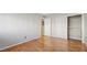 Bright bedroom with hardwood floors, neutral paint, closet space, and ample natural light at 1445 Monroe Ne Dr # 14F, Atlanta, GA 30324