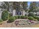 Elegant entrance to Carlyle Heights community with lush landscaping and decorative signage at 1445 Monroe Ne Dr # 14F, Atlanta, GA 30324