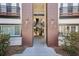 Condo exterior with well-kept grounds, wood accents, and stairs to multiple floors at 1445 Monroe Ne Dr # 14F, Atlanta, GA 30324