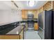 Well-lit kitchen featuring stainless steel appliances, granite countertops, and ample storage at 1445 Monroe Ne Dr # 14F, Atlanta, GA 30324