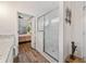 Bathroom with glass shower door, granite counters and easy access to the bedroom at 2638 Songbird Ln, Grayson, GA 30017