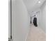 Hallway with neutral colored carpet and painted walls at 2638 Songbird Ln, Grayson, GA 30017