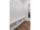 Well-organized mudroom with bench seating, coat hooks, and convenient access to the laundry room at 2638 Songbird Ln, Grayson, GA 30017