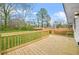 Wooden backyard deck with an attached fenced backyard at 733 Pegg Sw Rd, Atlanta, GA 30315