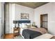 Cozy bedroom with hardwood floors and a walk-in closet at 855 Peachtree Ne St # 1906, Atlanta, GA 30308