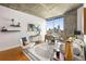 Living area offering city views, modern decor, and concrete accent wall and ceiling at 855 Peachtree Ne St # 1906, Atlanta, GA 30308