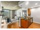 Modern open-concept living room featuring a dining area and a sleek kitchen with granite countertops at 855 Peachtree Ne St # 1906, Atlanta, GA 30308