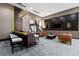 Luxurious lounge area with modern design, ample seating, and a stylish bar at 855 Peachtree Ne St # 1906, Atlanta, GA 30308