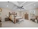 Spacious main bedroom featuring a tray ceiling, carpet floors, and soft natural light at 2011 Braeburn Se Cir, Atlanta, GA 30316
