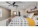 Spacious bedroom boasts neutral walls, vaulted ceiling with fan, and patterned bedding at 2011 Braeburn Se Cir, Atlanta, GA 30316