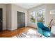 Bedroom features include hardwood flooring, natural light, and a plush area rug at 2011 Braeburn Se Cir, Atlanta, GA 30316