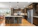Beautiful kitchen with granite countertops, stainless steel appliances, and a breakfast bar at 2011 Braeburn Se Cir, Atlanta, GA 30316