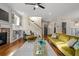 Bright living room with a fireplace, hardwood floors, and stylish decor at 2011 Braeburn Se Cir, Atlanta, GA 30316
