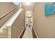 View of the entryway into a living room of a home with hardwood floors and a staircase at 2173 Dillard Xing, Tucker, GA 30084