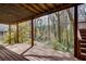 View from under deck space showcases a peaceful backyard with mature trees and natural landscaping at 2242 Greencrest Ne Dr, Atlanta, GA 30345