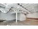 Partially finished basement featuring wood laminate flooring and exposed ducts at 2242 Greencrest Ne Dr, Atlanta, GA 30345