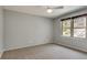 Neutral bedroom with ample natural light from the two windows at 2242 Greencrest Ne Dr, Atlanta, GA 30345