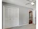 Spacious bedroom featuring a ceiling fan and closet for ample storage at 2242 Greencrest Ne Dr, Atlanta, GA 30345