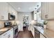 Updated kitchen with granite countertops, stainless steel appliances, and subway tile backsplash at 2242 Greencrest Ne Dr, Atlanta, GA 30345