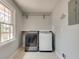 Functional laundry room featuring a modern washer and dryer at 2242 Greencrest Ne Dr, Atlanta, GA 30345