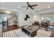 Open-concept living space with hardwood floors, a dining area, and comfortable seating at 2242 Greencrest Ne Dr, Atlanta, GA 30345