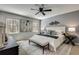 Serene main bedroom featuring natural light, modern decor, carpet and a comfortable bed at 2242 Greencrest Ne Dr, Atlanta, GA 30345