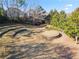 Scenic community amphitheater and lawn featuring stone steps and a circular stage at 2591 Royston Dr, Duluth, GA 30097