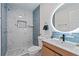 Stylish bathroom with a glass-enclosed shower, modern fixtures, and a sleek vanity at 2591 Royston Dr, Duluth, GA 30097