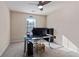 Bedroom/Office with carpeted flooring, natural light and a modern computer setup at 2591 Royston Dr, Duluth, GA 30097