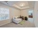 Cozy bonus room with neutral carpet and a doorway into the Primary bathroom at 2591 Royston Dr, Duluth, GA 30097