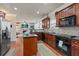 Well-equipped kitchen with granite countertops and stainless appliances, open to the living area at 2591 Royston Dr, Duluth, GA 30097