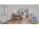 Spacious kitchen with bar seating, wood floors, and ample countertop space at 2591 Royston Dr, Duluth, GA 30097