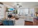 Inviting living room with fireplace, built-in shelving, hardwood floors, and natural light at 2591 Royston Dr, Duluth, GA 30097