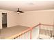 Bonus room with plush carpet and neutral walls located at the top of the stairs at 3356 Sardis Bend Dr, Buford, GA 30519