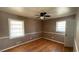 Comfortable bedroom with hardwood floors and ample natural light, creating a relaxing personal retreat at 781 E Glochester Pl, Norcross, GA 30071