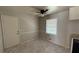 Cozy dining area featuring updated tile flooring, a ceiling fan, and natural light at 781 E Glochester Pl, Norcross, GA 30071