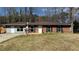 Charming single-story home featuring a brick facade and well-maintained front yard, perfect for suburban living at 781 E Glochester Pl, Norcross, GA 30071