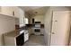 Functional kitchen featuring ample counter space and essential appliances, ready for culinary adventures at 781 E Glochester Pl, Norcross, GA 30071