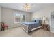 Comfortable bedroom featuring a ceiling fan and bright windows at 1463 Bailey Farm Sw Dr, Marietta, GA 30064