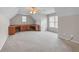 Spacious bonus room featuring a custom desk with natural lighting at 1463 Bailey Farm Sw Dr, Marietta, GA 30064
